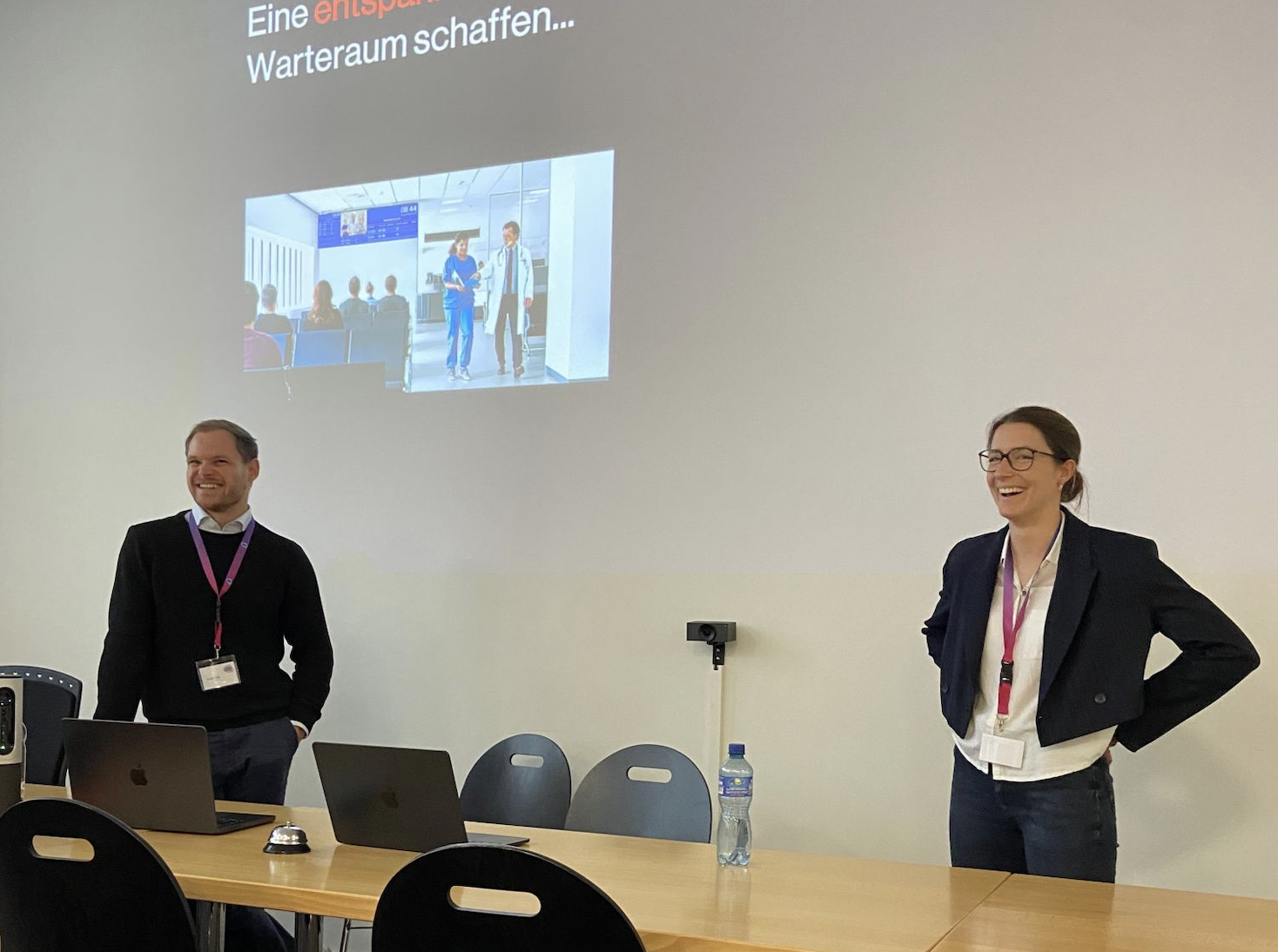 AInable founder presenting interactive GenAI workshop session to engaged corporate participants